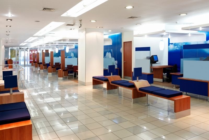 Commercial tiling floor with benches and office furniture