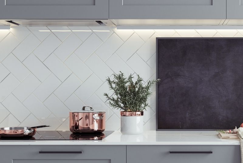 White tiled kitchen splashback
