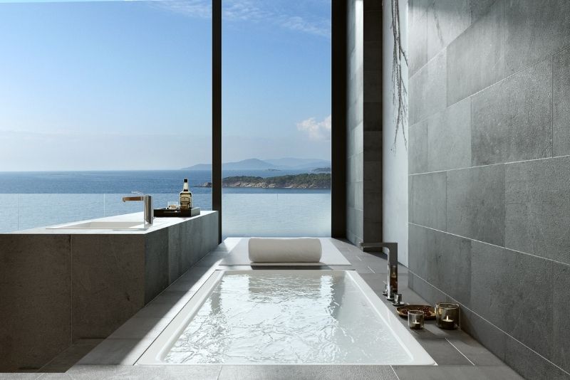 Grey tiled bathroom wall installation